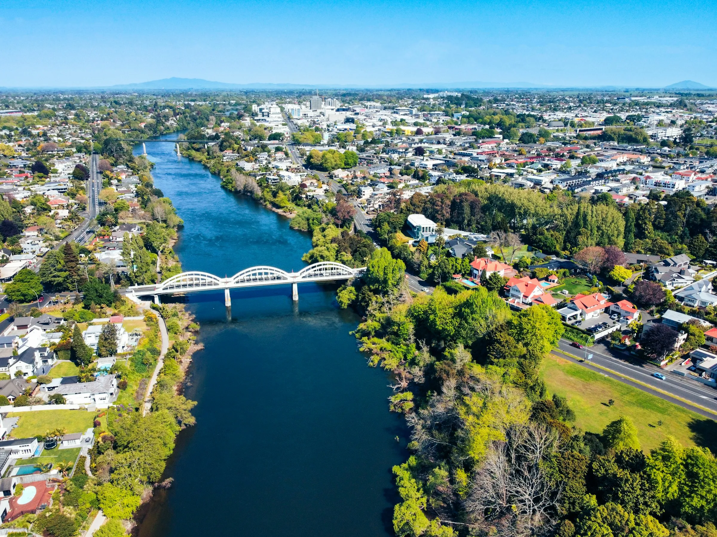 Aerial view of Hamilton and the Waikato River on a sunny day